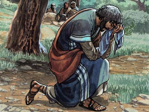 ひざまずき祈るイエス・キリスト